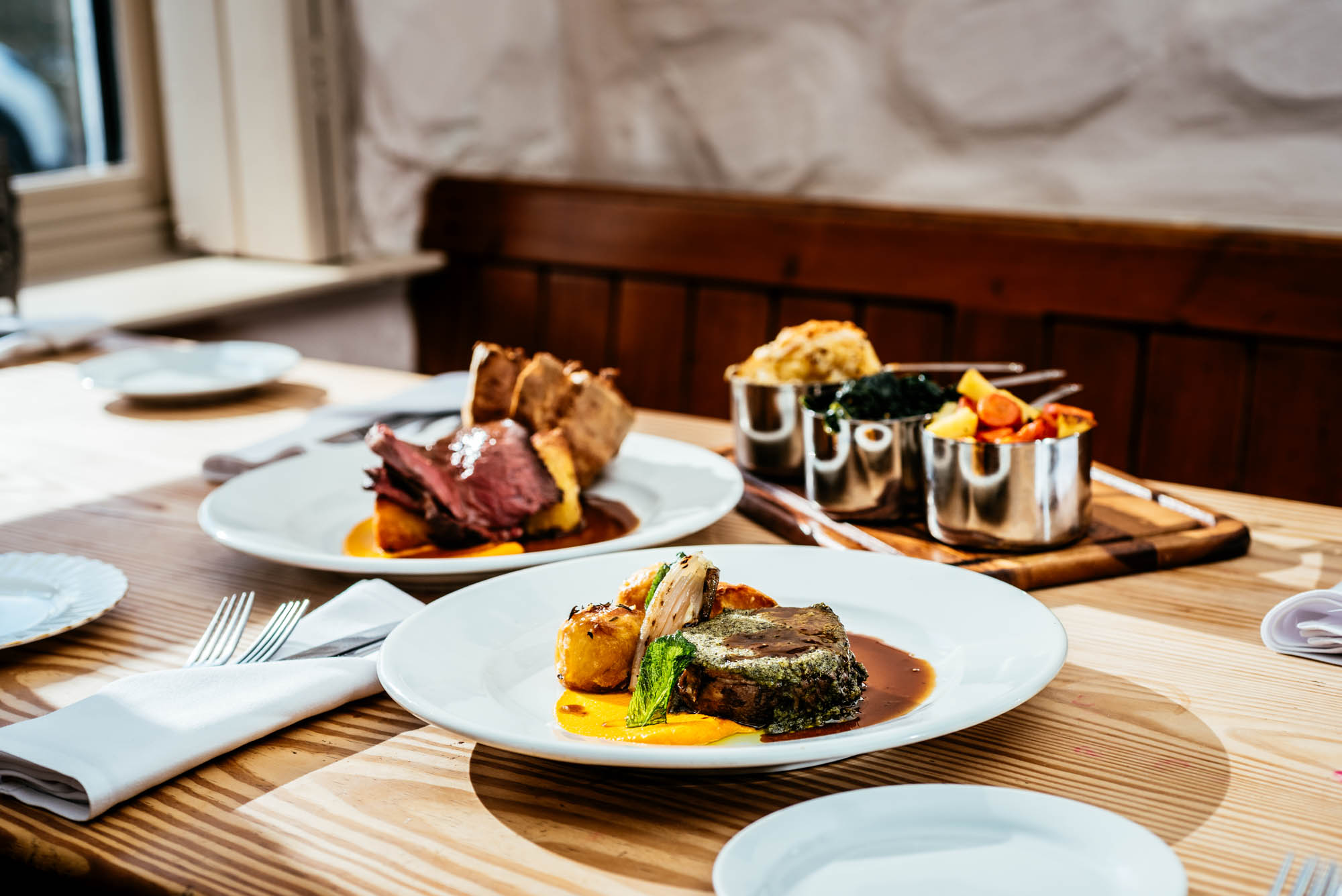 A photo of a sunday roast with beautiful window light