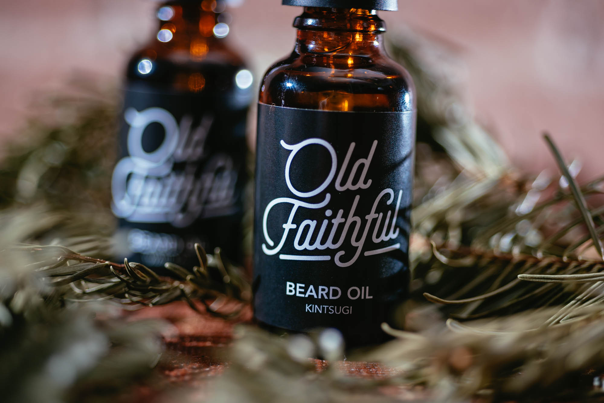 A photo of two bottles of beard oil