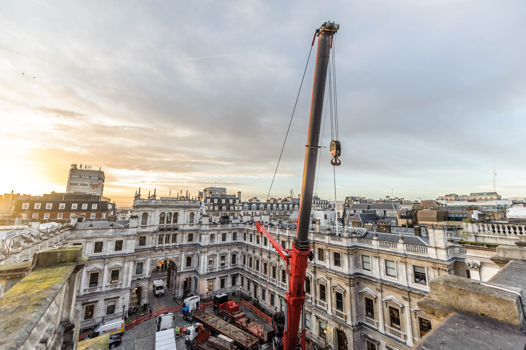 A photo of a crane rising above the london skyline